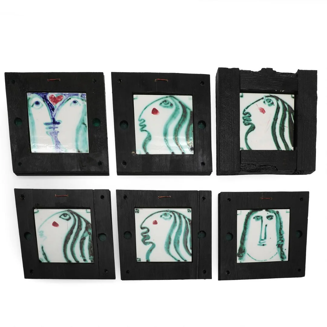 “Eva” a.o. Six glazed ceramic tiles, mounted in black-painted frames. Unsigned. Each 15×15. Incl. frames 25×25–26×26 cm. (6) — Modern Decorative Art — Bruun Rasmussen