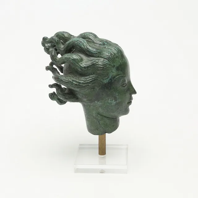 CARL MILLES. efter, patinerad brons, sockel i plexiglas, "Änglahuvud", stämplad Millesgården.