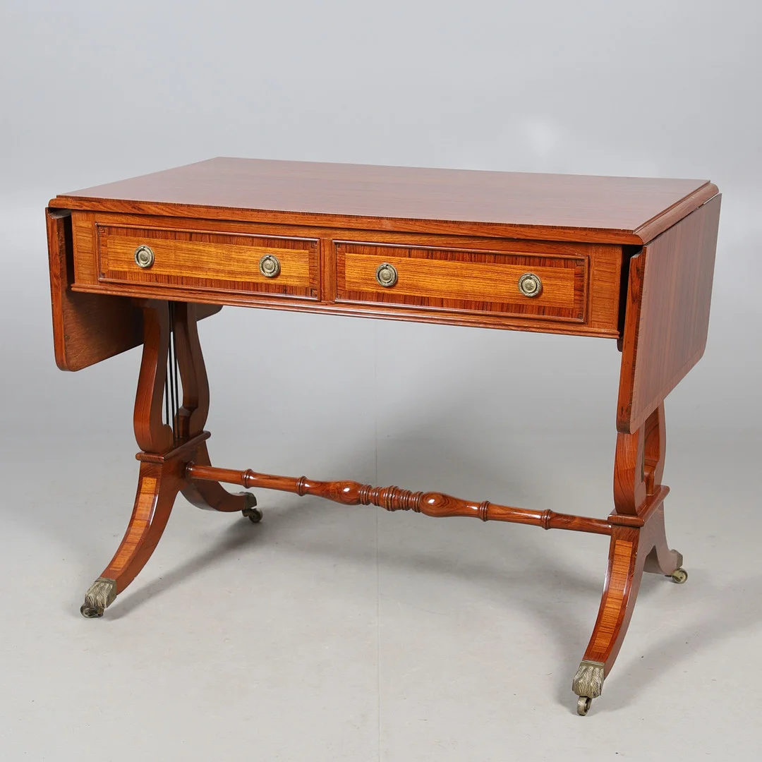 A REPRODUCTION INDIAN ROSEWOOD SOFA TABLE. — Tables — Lawrences Auctioneers
