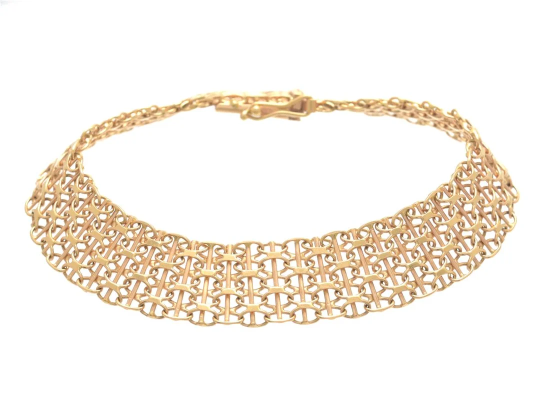 ARMBAND, 18K guld, x-länk med stav, bredd 12 cm, längd 19 cm, vikt 14,0 g. — Smycken/Armband — Kaplans