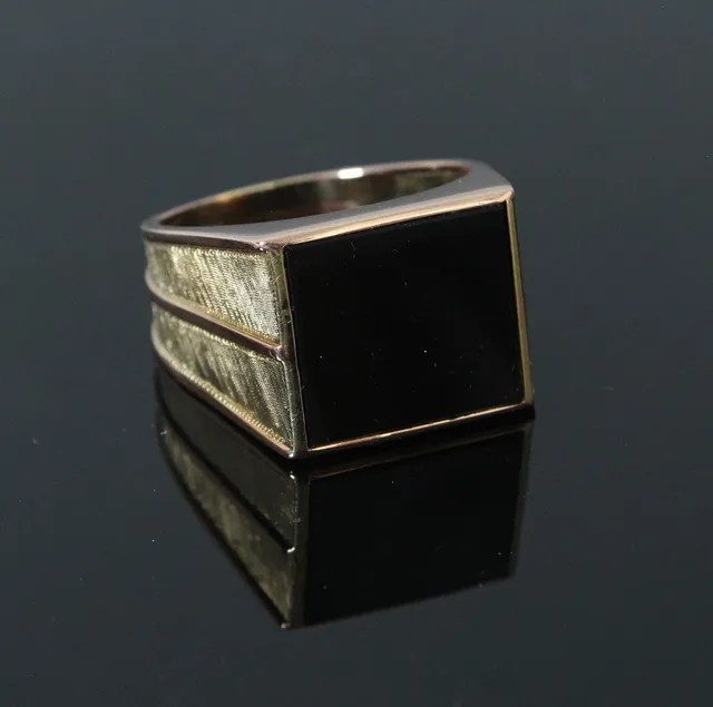 Siegelring mit Onyx, 585er Gelbgold/Roségold.