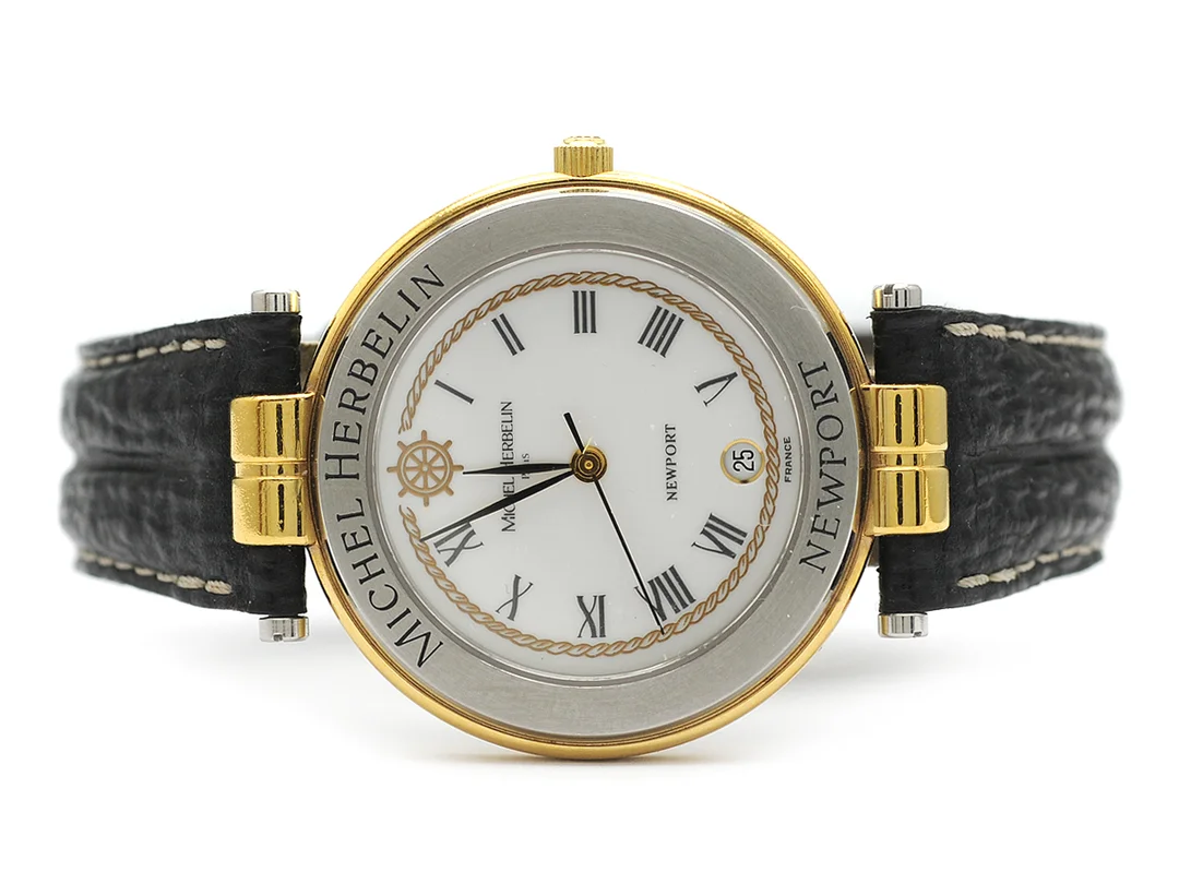 MICHEL HERBELIN, Paris, Newport, Boett nr. 12456.S, herrur, 34,5 mm, bicolour, quartz, safirglas, datum, skadad urtavla, integrerat läderband, cert, september 1997, box. — Klockor/Michel Herbelin — Kaplans