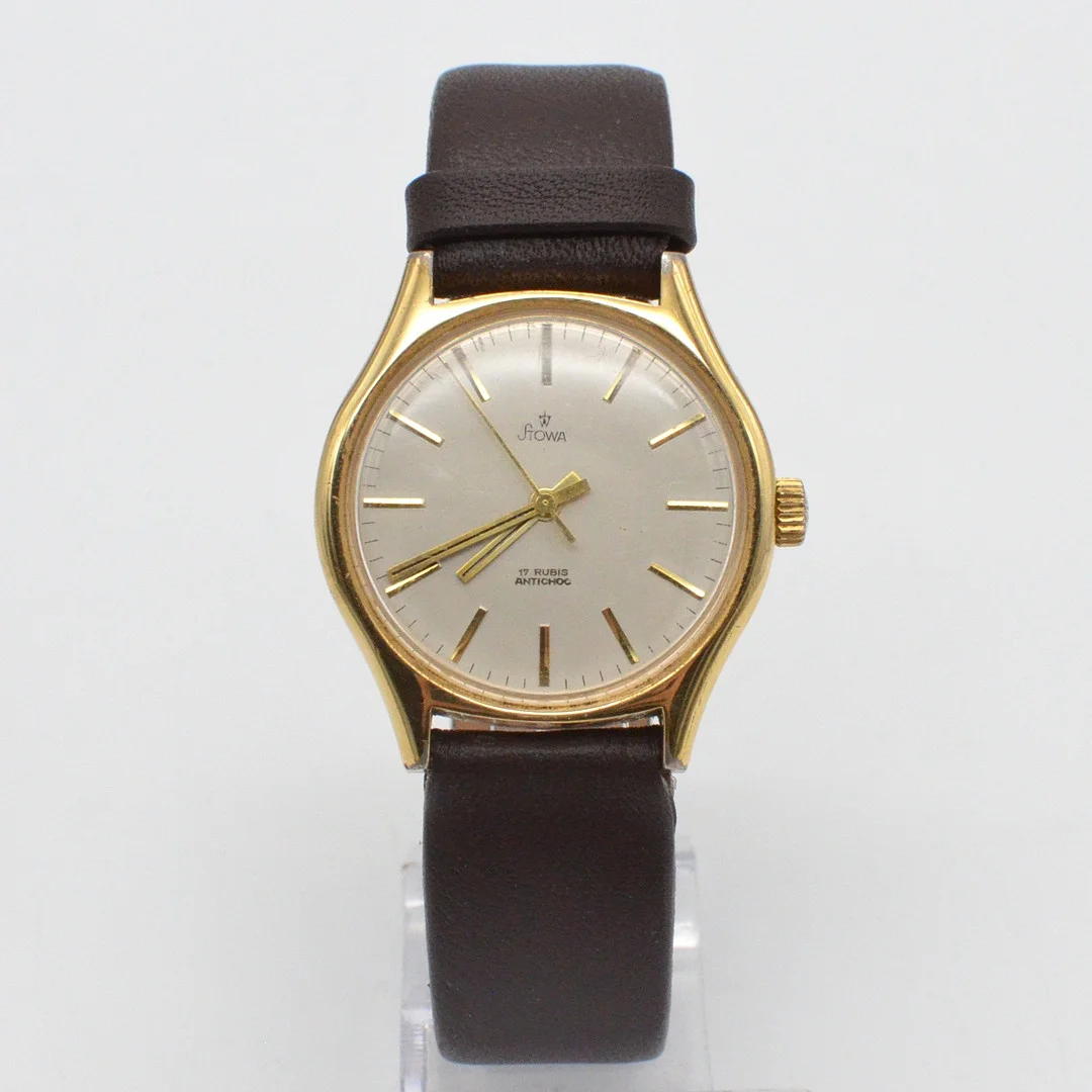 STOWA, HERRENARMBANDUHR, 17 RUBIS, ANTICHOC, MIT HANDAUFZUG, VERGOLDETES GEHÄUSE, UM 1960ER JAHRE. — Wristwatches — Kunst- und Auktionshaus Kleinhenz
