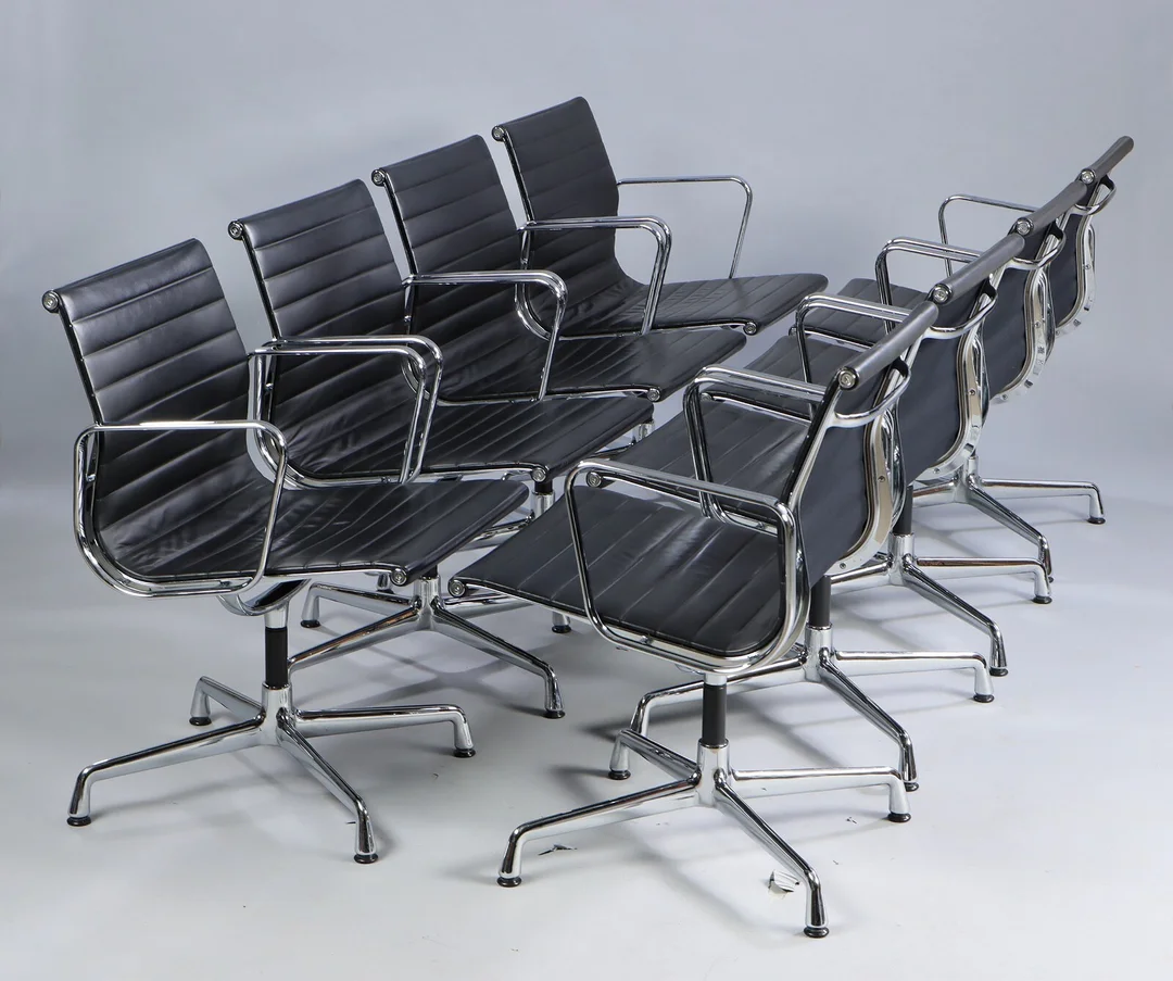 Charles Eames. A set of eight armchairs, model EA 108, black leather. (8) — Furniture/Lounge chairs — Lauritz