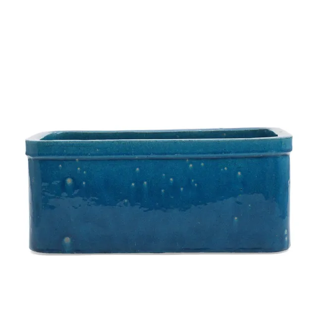 Stoneware jardinière decorated with turquoise glaze. Signed HAK. 1970s. H. 17.5. W. 22. L. 42 cm.