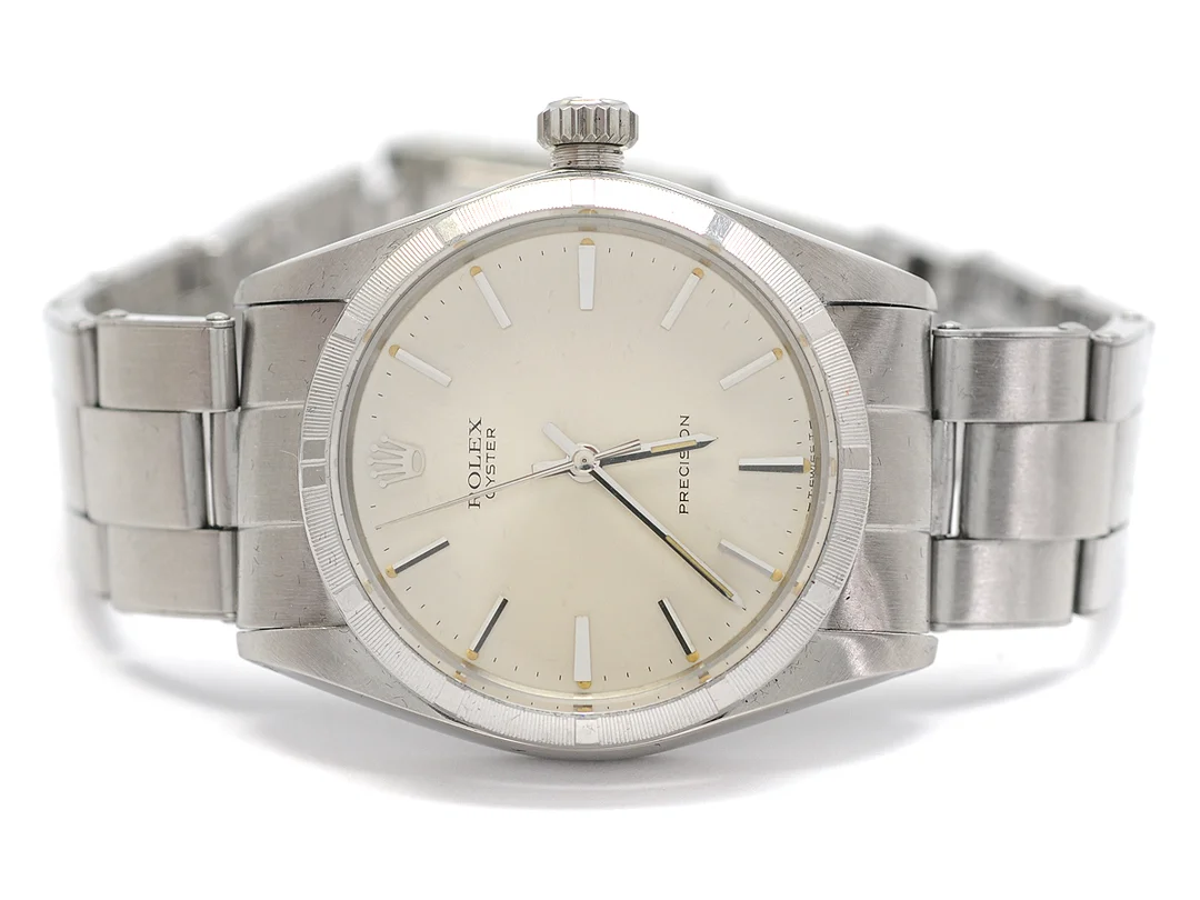 ROLEX, Oyster, Precision, Ref nr. 6427, Serie nr. 2324919, Cal 1225, Verk nr. 9083, Boett nr. 6426, herrur, 34 mm, stål, manuell, plexiglas, skadad urtavla, Oysterlänk, viklås, Ref nr. 7205-4/70/60, servad april 2011, tillverkad fjärde kvartalet 1969. — Klockor/Rolex — Kaplans