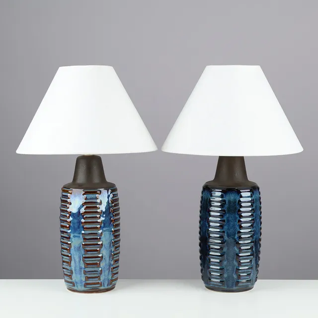 EINAR JOHANSEN. A pair of table lamps made of blue-glazed stoneware with vertical rows of grooved reliefs, model no. 1034, Søholm, Bornholm, Denmark, 1950/60s, (2).