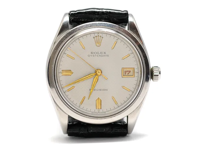 ROLEX, Oysterdate, Precison, Ref nr. 6294, Serie nr. 962215, Cal 740, Verk nr. 12010, Boett nr. 6294, herrur, 34 mm, stål, manuell, plexiglas, datum, renoverad urtavla, skadad urtavla, skadad boett, läderband, ca tillverkad andra kvartalet 1954.