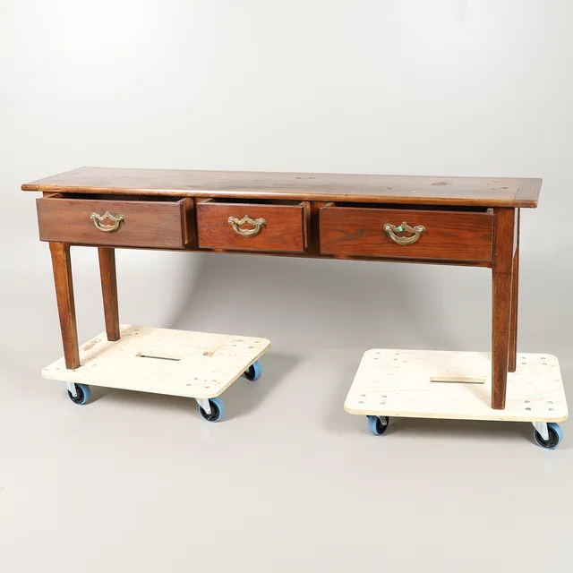 A LARGE OAK SIDEBOARD.