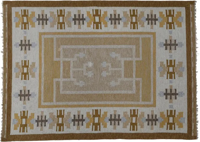 A handwoven wool carpet in “rölakan” flatweave technique. Geometric pattern in shades of brown and grey. Signed IS. L. 231 cm. W. 166.5 cm.