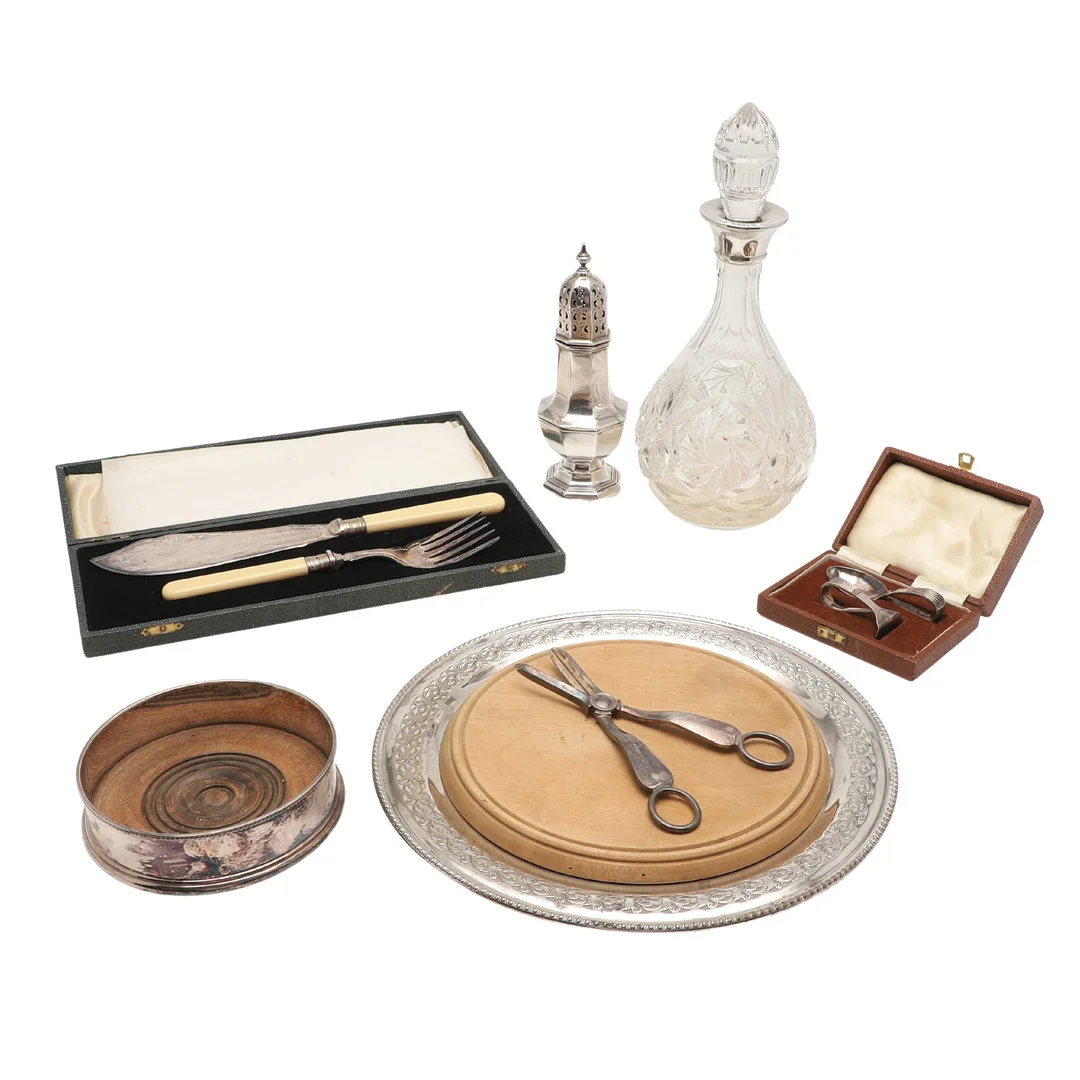 A SILVER SUGAR CASTER, SILVER MOUNTED GLASS DECANTER & VARIOUS PLATED WARES. — Silver — Lawrences Auctioneers