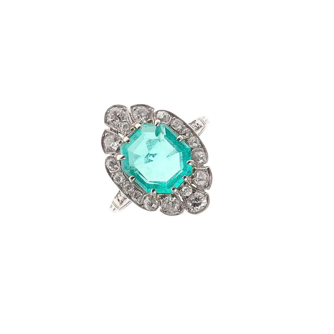 AN EMERALD AND DIAMOND CLUSTER RING. — Rings — Lawrences Auctioneers