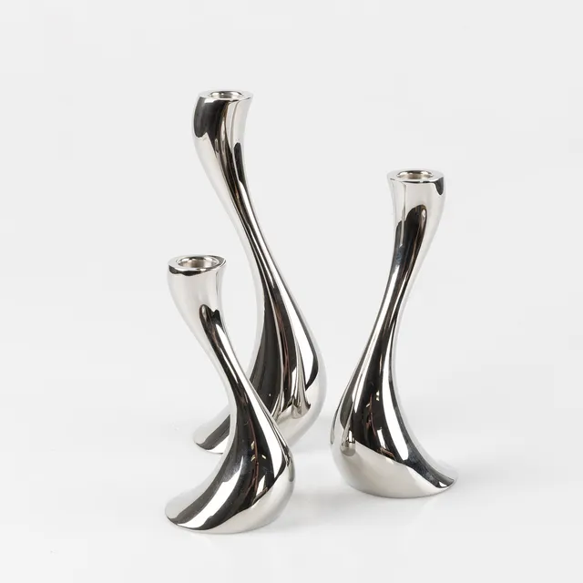 CONSTANTIN WORTMANN. Ljusstakar, 3 stycken "Cobra", för Georg Jensen, rostfritt stål.