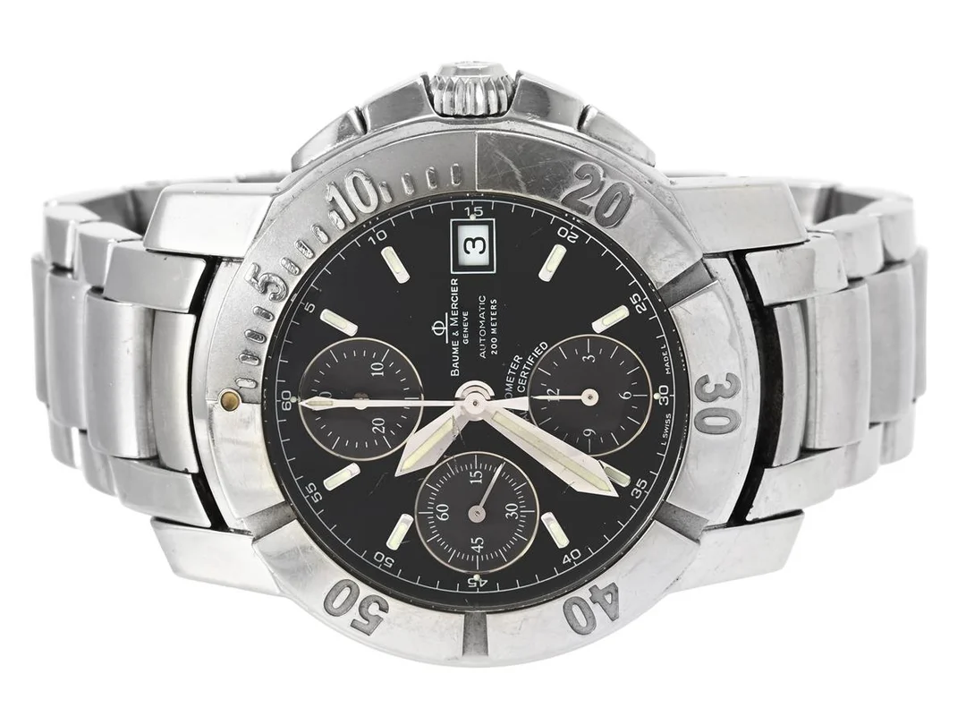 BAUME & MERCIER, Capeland S, Chronometer, Cal 13750 (ETA 7750), Verk nr. 109´751, Ref nr. MOA08502, Serie nr. x290x6x , Boett nr. 65352, kronograf, herrur, 40 mm, stål, automatisk, safirglas (skadat), datum, originallänk, viklås, Ref nr. UFGL, ca 2005. — Klockor/Baume&Mer — Kaplans