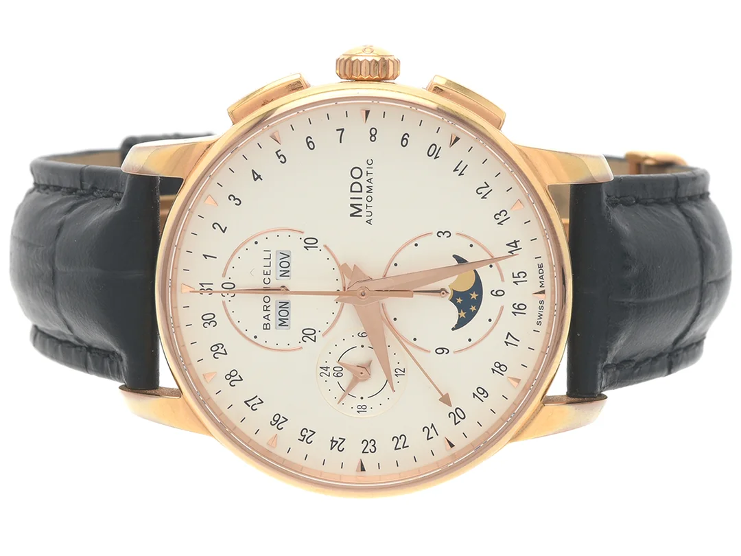 MIDO, Baroncelli, Cal 1321 (ETA 7751), Serie nr. 15BG0376357, Ref nr. M8607.3.M1.42, Boett nr. M8607 B, kronograf, herrur, 42 mm, doublé, automatisk, safirglas, dag, datum, månad, månfas, 24-timmarsvisning, glasbaksida, läderband, viklås, Ref nr. M640.12 BN, cert, augusti 2017, box, ytterkartong. — Klockor/Mido — Kaplans