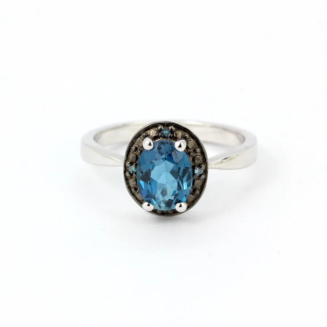 SILVER, LONDON BLUE TOPAZ AND FANCY BLUE DIAMOND SET RING. — Rings — Chalkwell Auctions