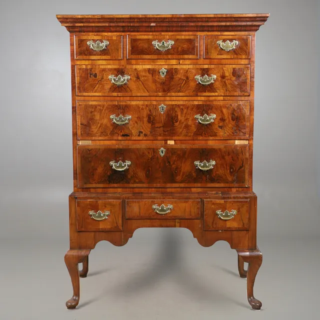AN 18TH CENTURY WALNUT CHEST ON STAND.