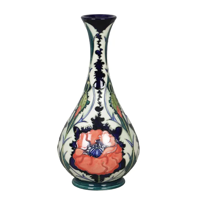 A MOORCROFT POPPY POTTERY VASE.