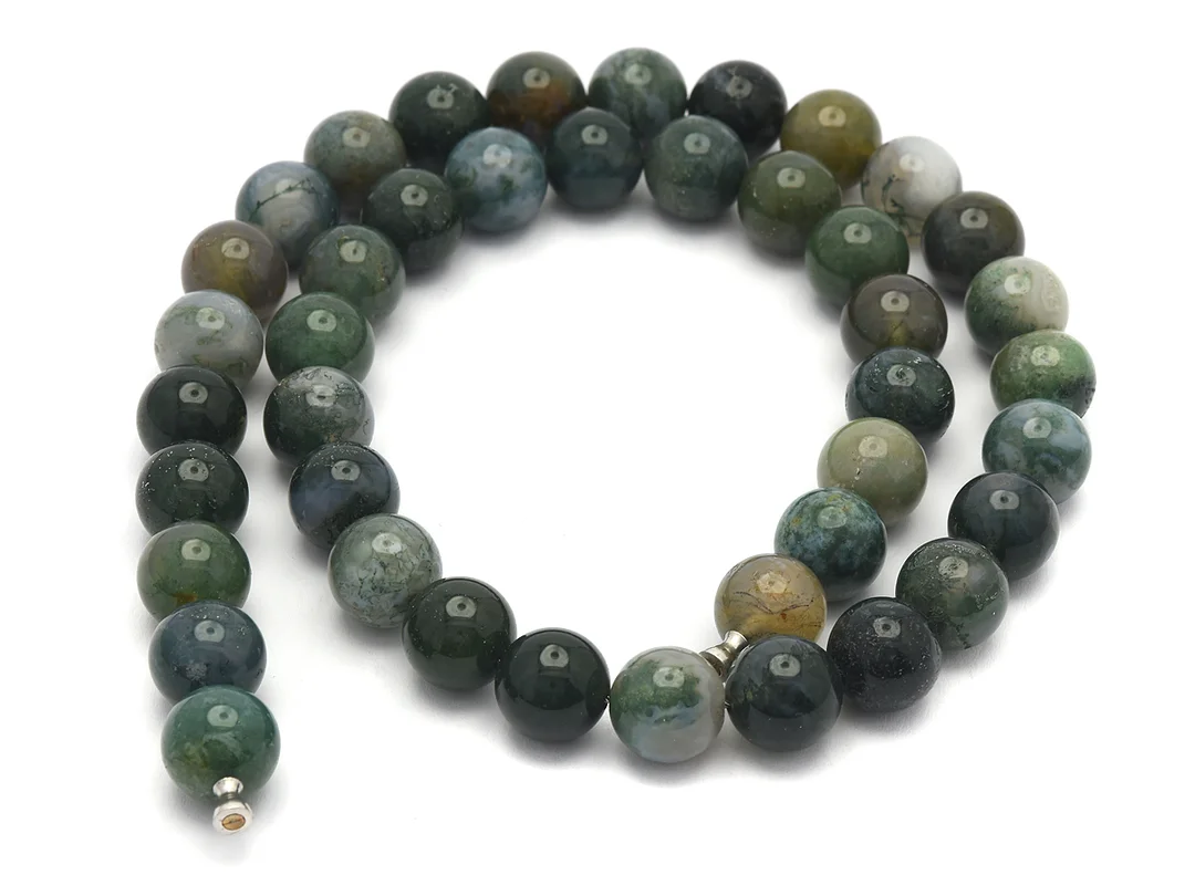 COLLIER, gröna stenkulor ca 10,15 mm, dobbar, stålvajer, för Ole Lynggaard, längd 43,5 cm. — Smycken/Collier — Kaplans