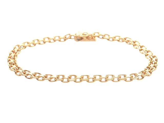 ARMBAND, 18K guld, x-länk, bredd ca 4,4 mm, längd ca 18 cm, vikt 7,5 g.