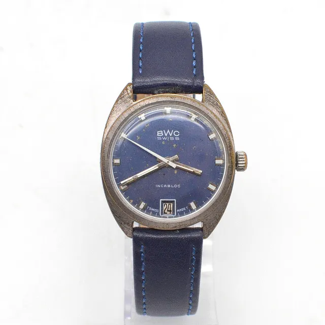 BWC SWISS INCABLOC, ARMBANDUHR, DAYDATE-ANZEIGE, Modell: 831002, HANDAUFZUG, UM 1970ER JAHRE.