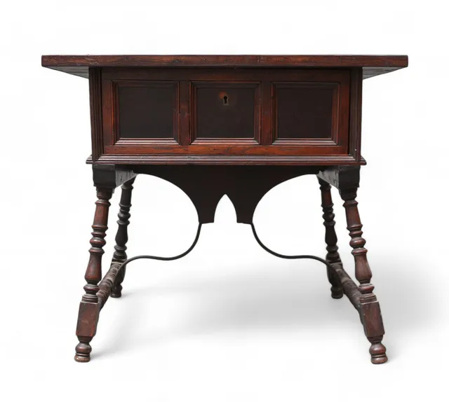 Baroque style platform table in carved and inked walnut, 19th Century.