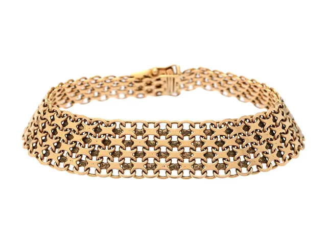ARMBAND, 18K guld, X-länk, bredd 13 mm, vikt 27,6 g.