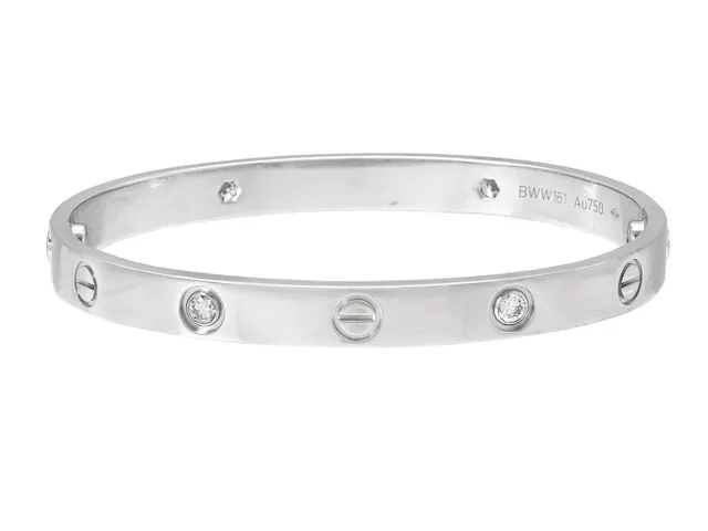 CARTIER, armband, Love bracelet, 18K vitguld, 4 briljantslipade diamanter 0,42 ctv, serienr BWW161, stl 17, vikt 31,8 g, smyckespåse, skadad skruvmejsel.