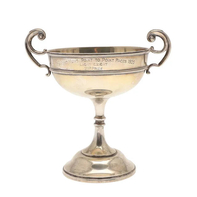 A GEORGE V SILVER HUNT TROPHY.