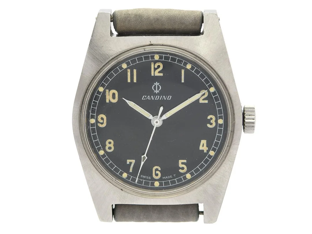 CANDINO, " T Swiss Made T", "Tre Kronor", herrur, 35 mm, Cal ETA 2750, Ref nr. 10511, Boett nr. 1396, stål, manuell, plexiglas, gravyr (Tre Kronor), läderband, ca 1968. — Klockor/Candino — Kaplans