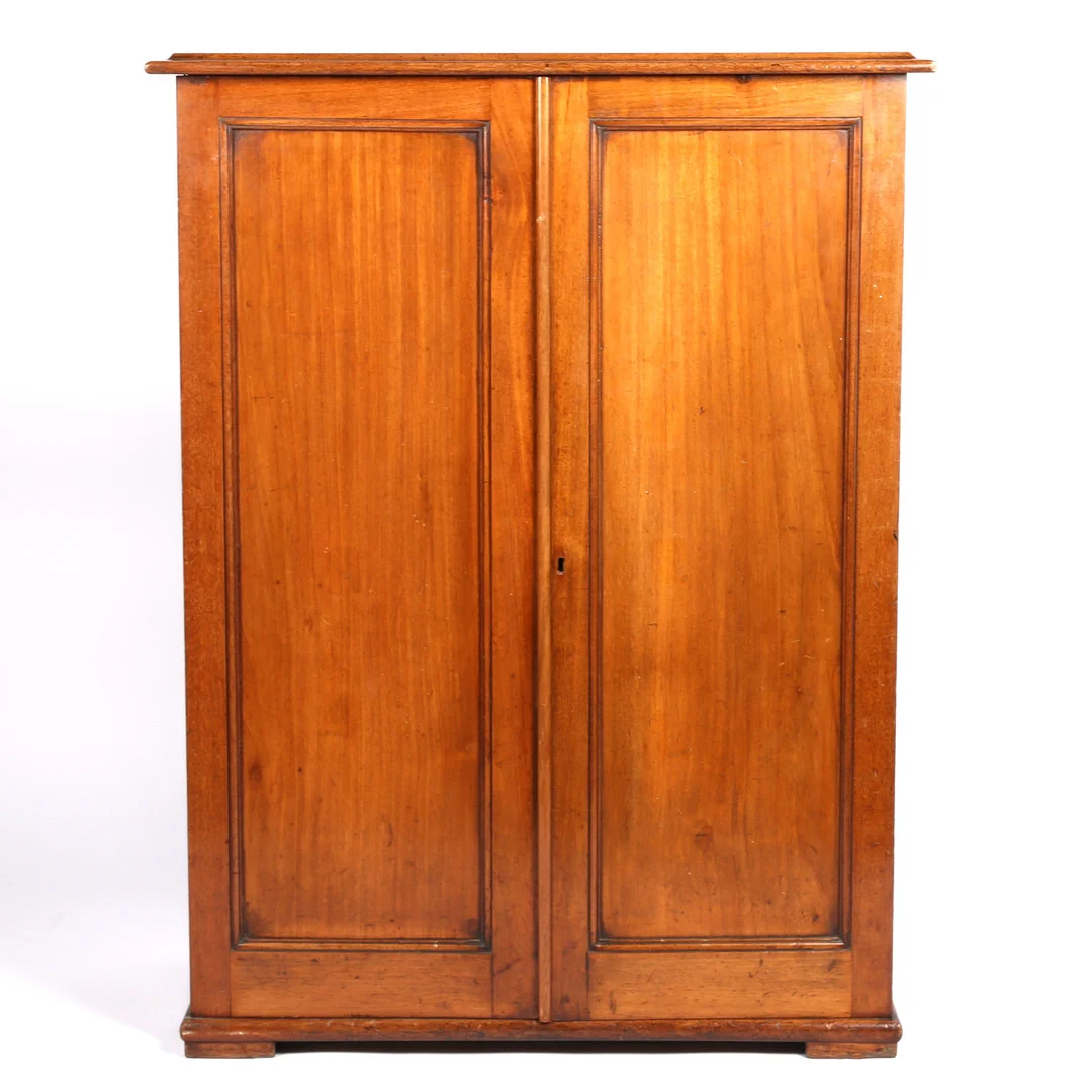 A VICTORIAN MAHOGANY TWO DOOR CUPBOARD. — Cupboards, Cabinets & Shelves — Bishop & Miller