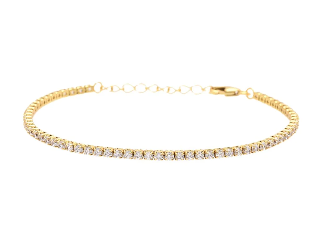 TENNISARMBAND, förgyllt sterlingsilver, cubic zirconia, längd 15-17,5 cm, vikt 2,8 g. — Smycken/Armband — Kaplans