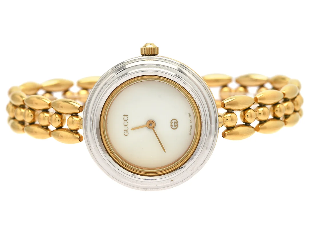 GUCCI, damur, 26 mm, Serie nr. 0171012, Boett nr. 11/12, doublé, quartz, mineralglas, skadad urtavla, 6 st. utbytbara ringar, integrerad originallänk, längd 175 mm, ca 1995, box. — Klockor/Gucci — Kaplans
