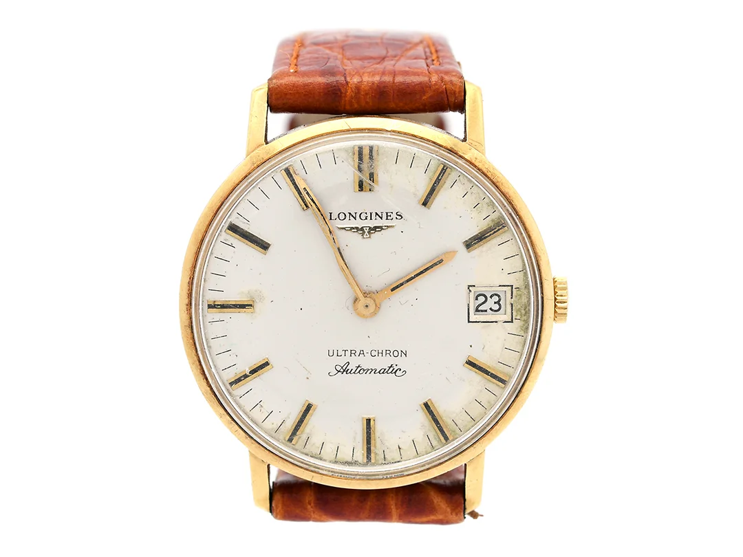 LONGINES, Ultra-Chron, Cal 431, Serie nr. 50957875, Boett nr. 16501794 / 4032 1, herrur, 34 mm, 18K guld, automatisk, plexiglas, datum, skadad visare, skadad urtavla, defekt, gravyr, läderband, ca 1975. — Klockor/Longines — Kaplans