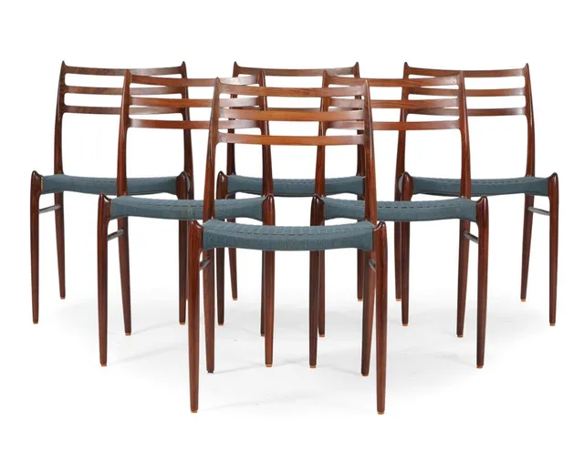 Six rosewood chairs, seats woven with blue cord. Model 78. Designed 1962. Manufactured by J. L. Møller, Højbjerg, 1960–70s.