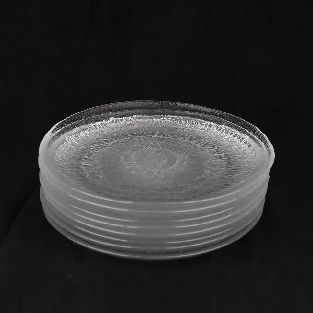 TAPIO WIRKKALA. Assietter, 8 st, "Solaris", glas, Iittala, Finland.