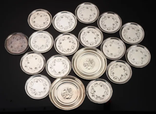 Georg Jensen. A set of sterling silver glass/bottle trays, design no. 41/51 (18)