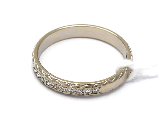 Ring vitguld 18K 2,7g Ø17 med åttkantslipade diamanter 10xca.0,01ct