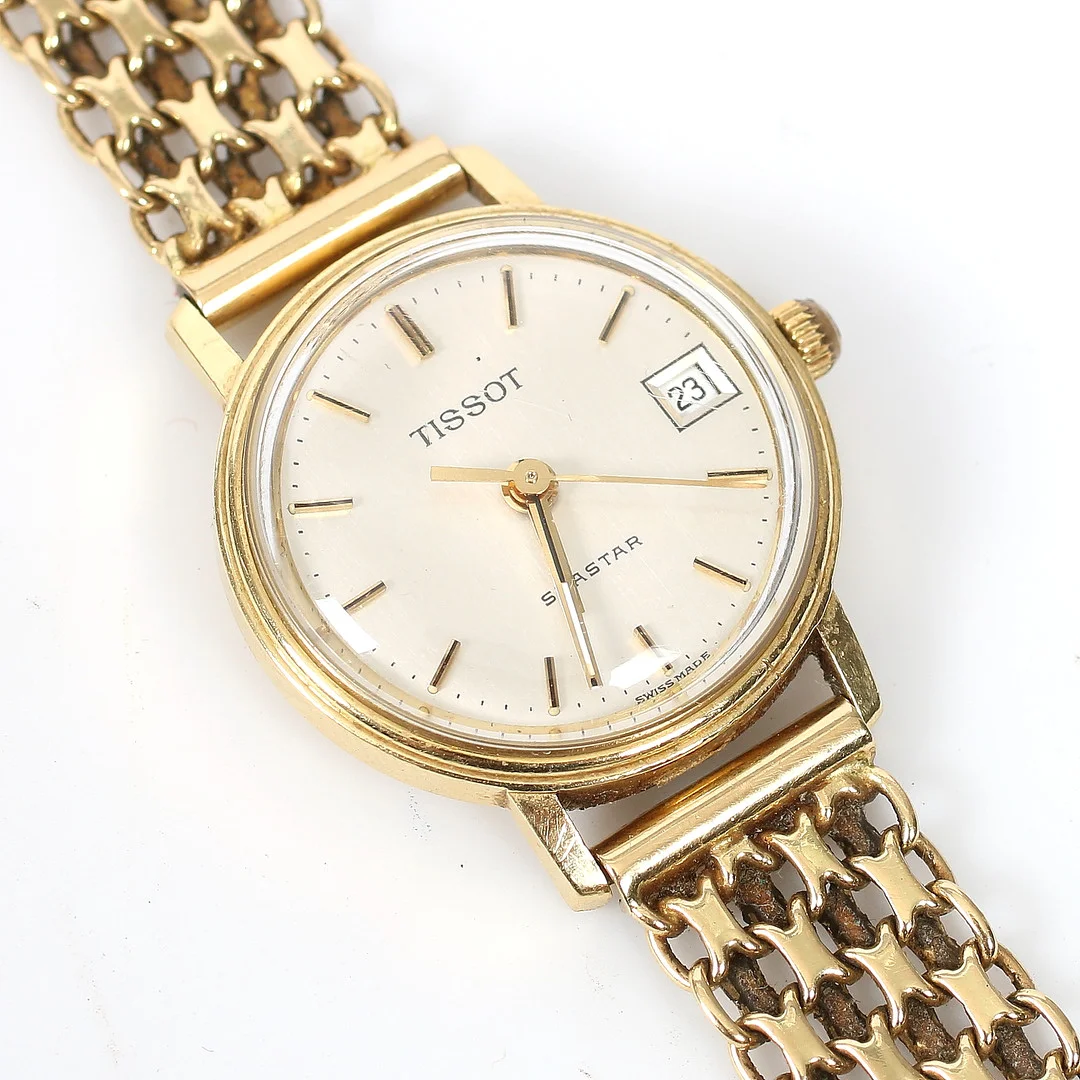 ARMBANDSUR och ARMBAND, 18k guld, Tissot Seastar, IPO Handels, Sundsvall. Bruttovikt 26,5 gram. — Wristwatches — Stadsauktion Sundsvall