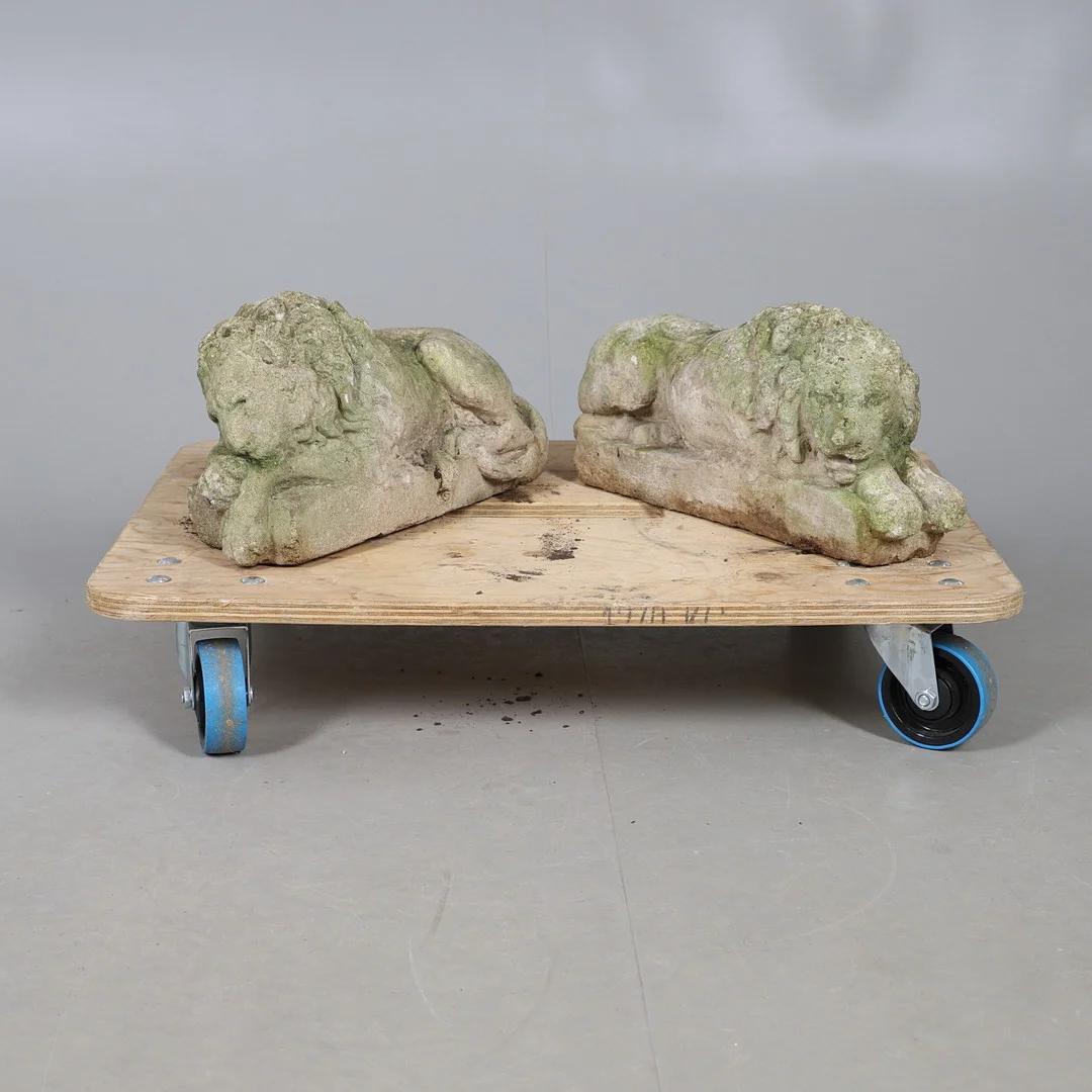 A PAIR OF RECONSTITUTED STONE LIONS. — Garden Sculptures & Urns — Lawrences Auctioneers