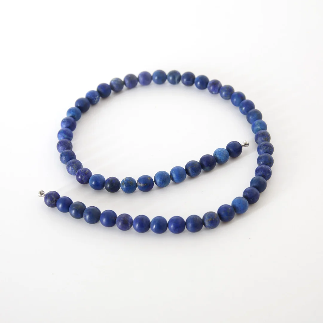 OLE LYNGGAARD. f 1936. Collier med lapis lazuli. — Necklace — Auktionsverket Engelholm