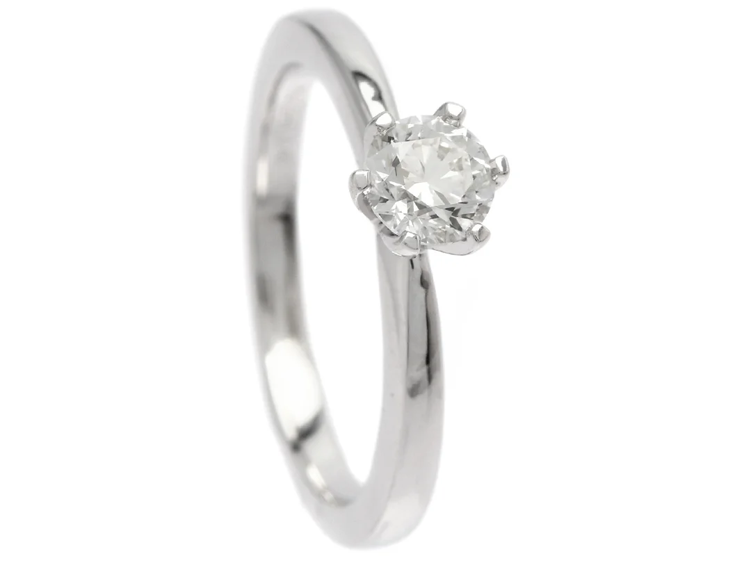ENSTENSRING, 18K vitguld, briljantslipad diamnat ca 0,40 ct, ca W(H)/SI, stl 15,75 mm, vikt 3,2 g. — Smycken/Enstensring — Kaplans
