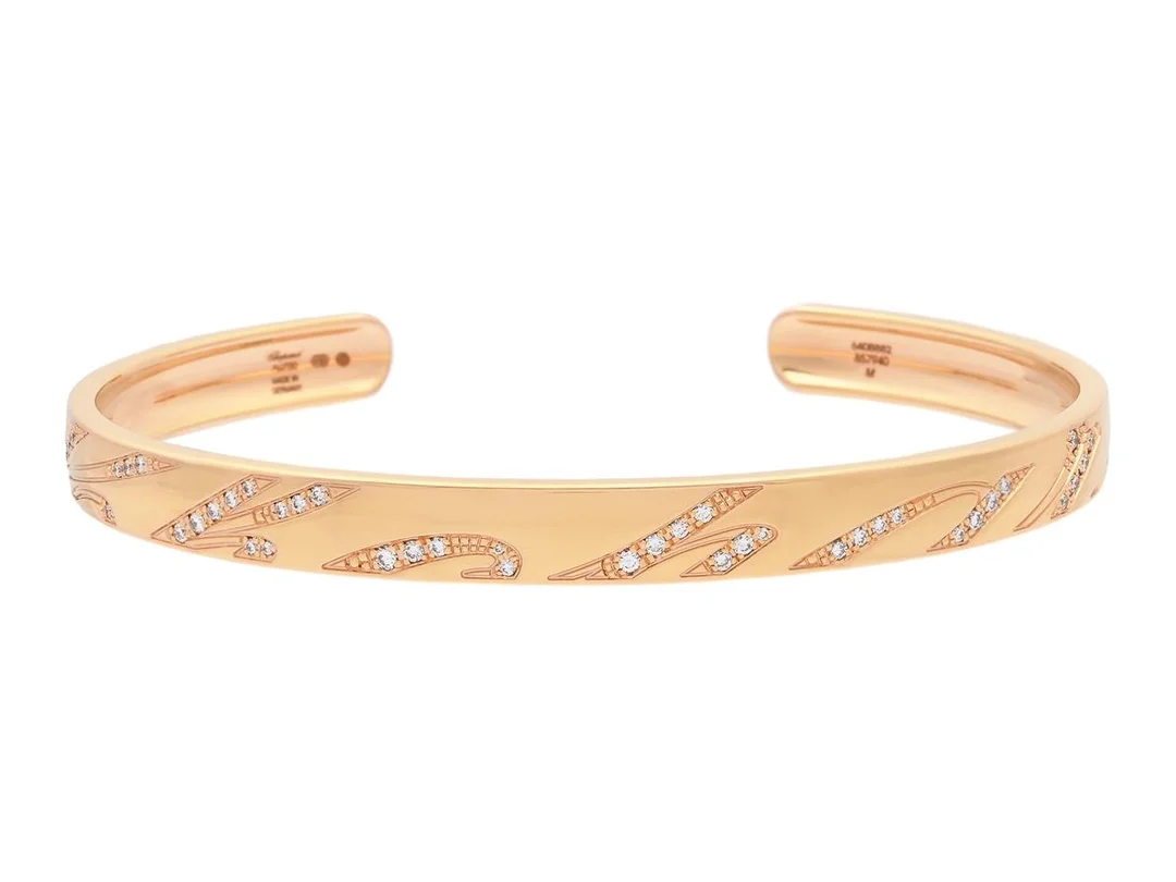 CHOPARD, armring, Chopardissimo, 18K guld, briljantslipade diamanter 0,37 ctv, TW/IF-VVS, ref. nr. 857940-5202, serienr. 6408882, stl M (ca 17 cm), vikt 18,1 g, certifikat, originaletui, ytterkartong. — Smycken/Armring — Kaplans