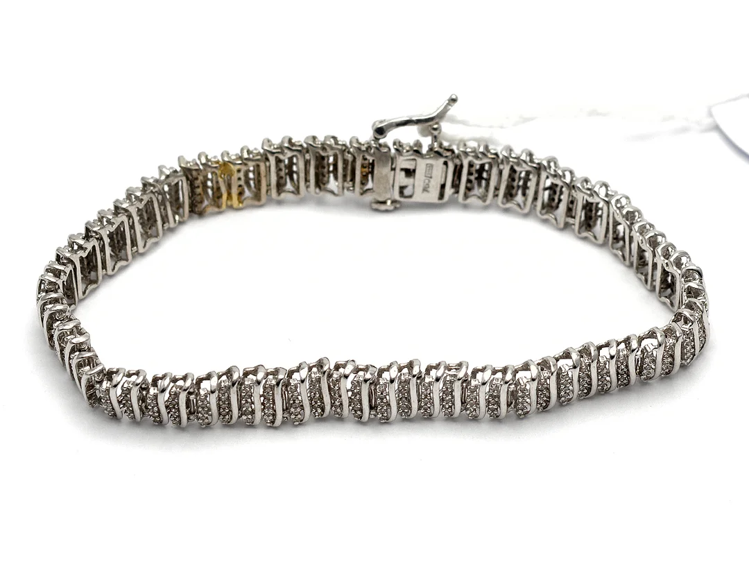 Armband, 18K 17,5cm 14,7g med diamanter 362xca0,005ct, 3 stycken saknas, skadad — Smycken/Armband — Kaplans
