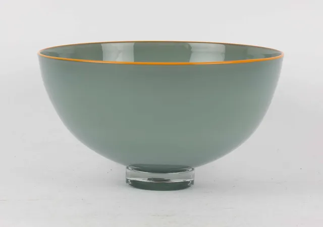 Anja Kjær (1956-) for Holmegaard: Bowl of grey-blue semi-transparent glass with a yellowish rim.