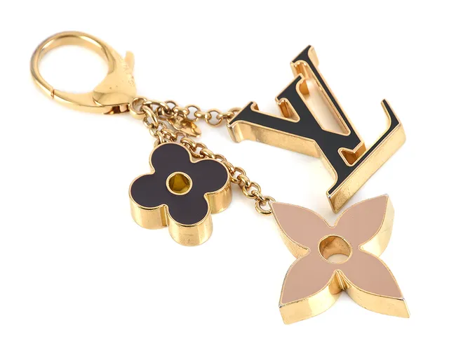 BAG CHARM/NYCKELRIN LOUIS VUITTON, Fleur de Monogram. gulmetall, emalj, dustbag, originalask.