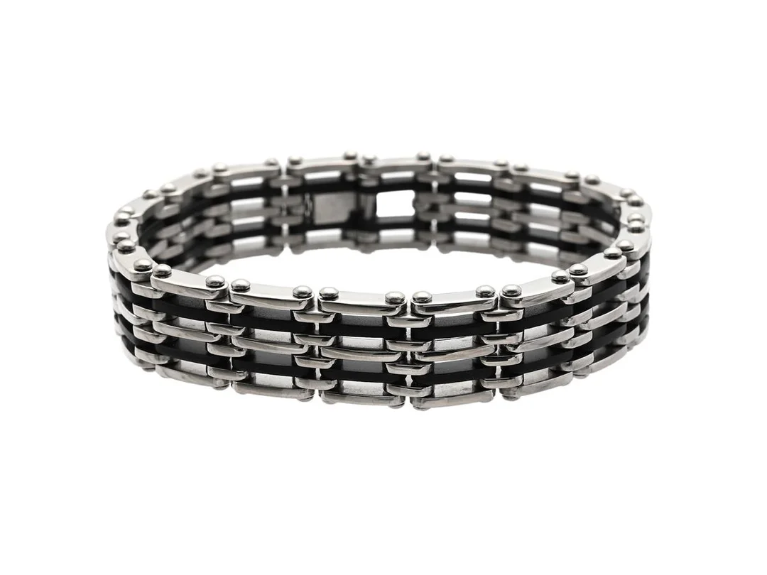 ARMBAND, stål och svart plast, fantasilänk, längd 21 cm, vikt 51,3 g. — Smycken/Armband — Kaplans