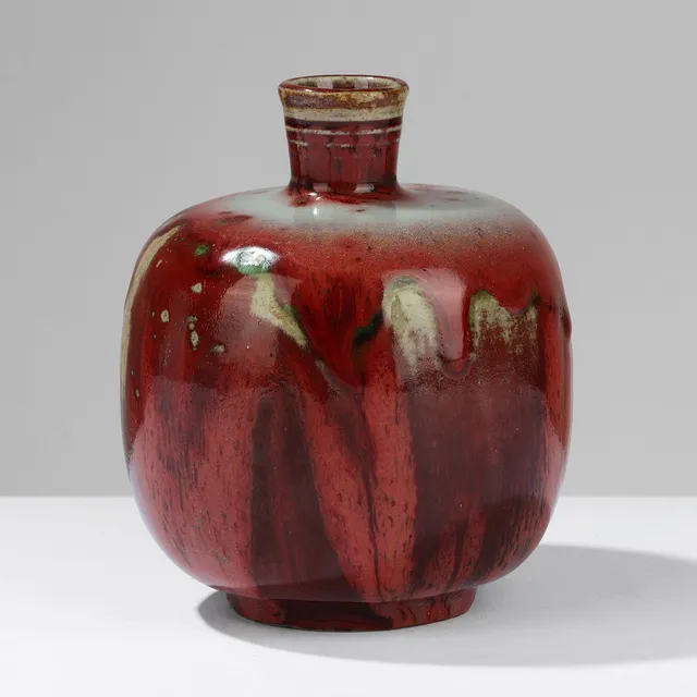 PATRICK NORDSTRÖM. Early, bulbous stoneware vase with short neck and unusually vivid oxblood glaze, executed at Royal Copenhagen in the period 1912-14, Denmark.