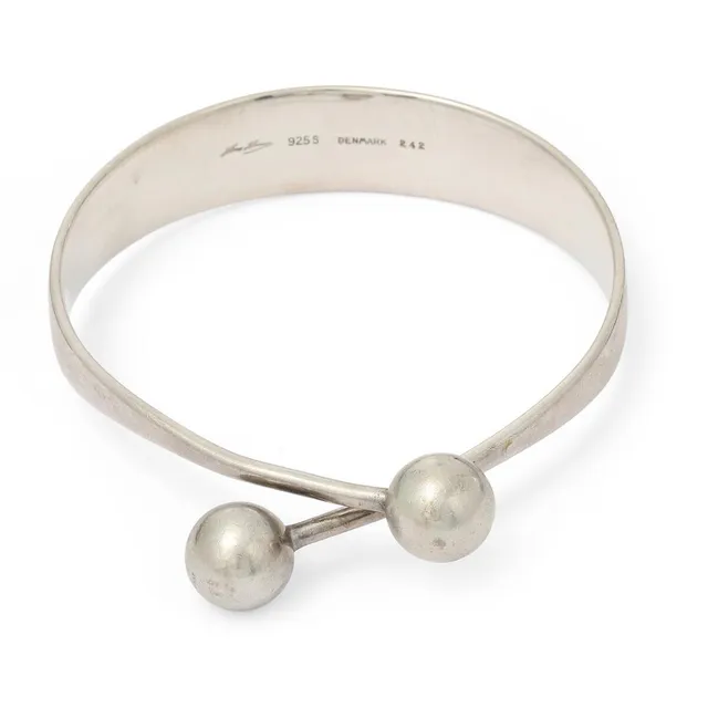 A sterling silver bangle. Design no. 242. Weight app. 43 g. Inner diam. app. 6.5 cm.