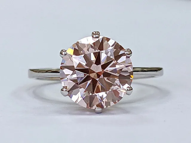 Ring in 18 kt. white gold with fancy intense pink colored lab-grown brilliant cut diamond of 2.50 ct.